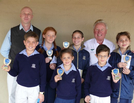With the primary school winners are headmaster Andrew Collie (left) and The Rest Nature Estate’s Alec Bates (right). The winners are, from left, Conrad Joubert, Heloïse Schormann, Julia van Aardt and Megan Millar. In the front are Juan Coetzee and Kirsten Lea, the foundation phase winners. 