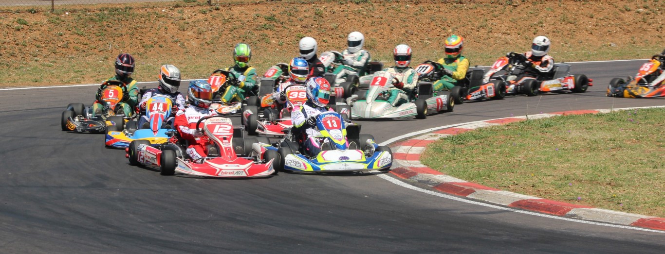 2015 SA Rotax Max Challenge DD2 champion Bradley Liebenberg (12) leads Nathan Parkins (13) and Arnold Neveling (44) at Zwartkops in the final round of the championship.
