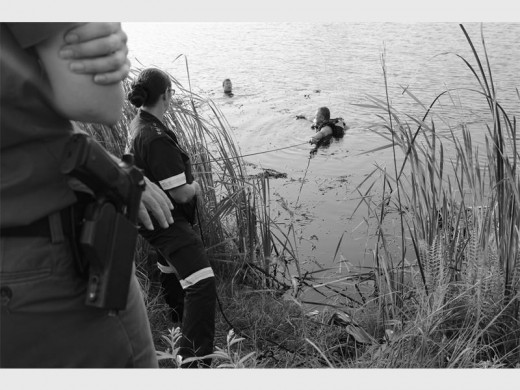 Police divers searched for the body of a 14-month-old boy after his parents allegedly dumped his body in this dam.