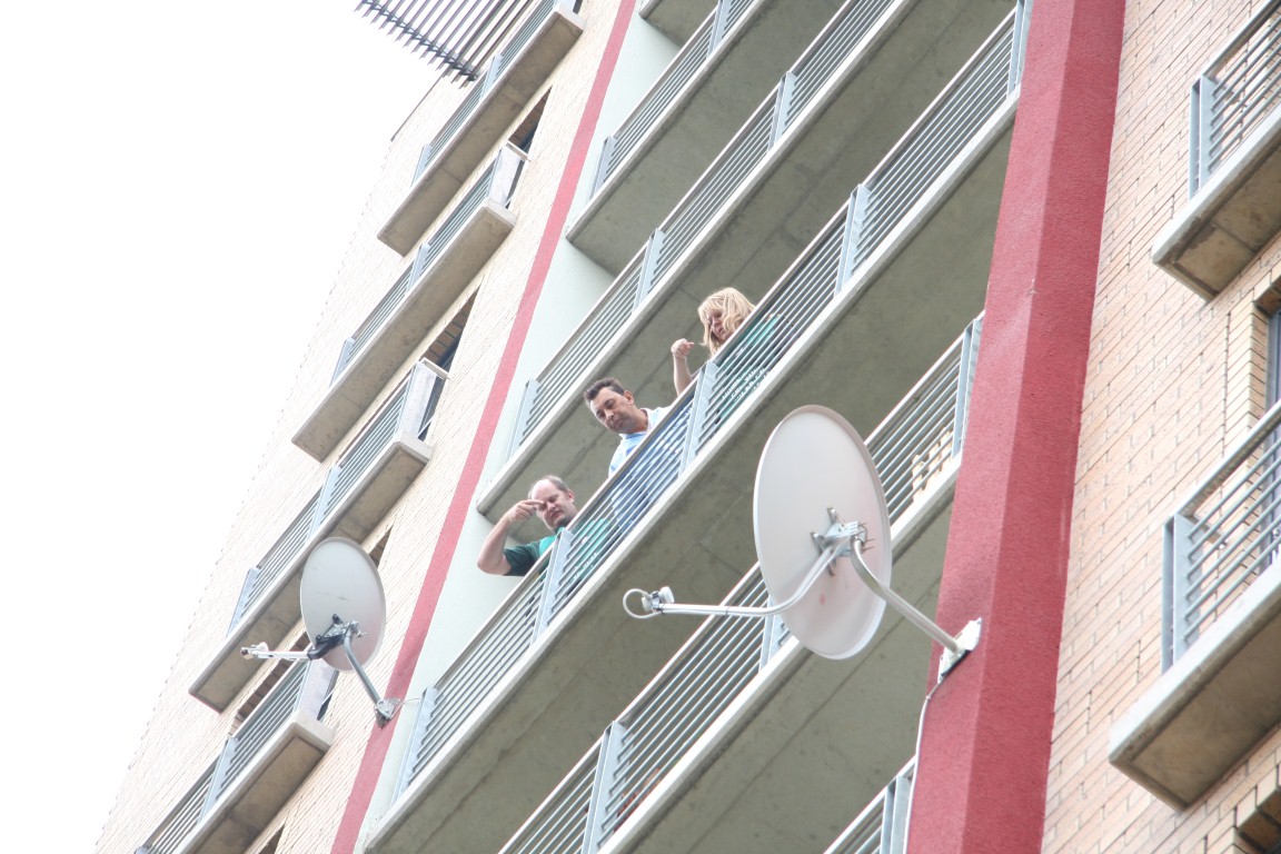 Forensic officials of the police on the balcony of Dr Phumsile Nkosi's flat. Photo: Carli Koch