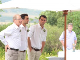 Roy Heine was keeping an eye out for his bride.  His sons, Timothy and Phillip were by his side on this photo.