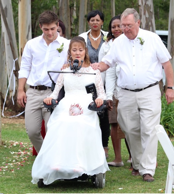 The bride with her son, Chad Ross Todd and her father, Henry Sinclair on either side.