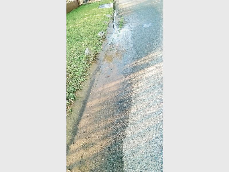 Water running down the street.