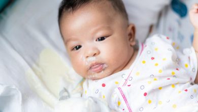 Why does my baby vomit after breastfeeding?