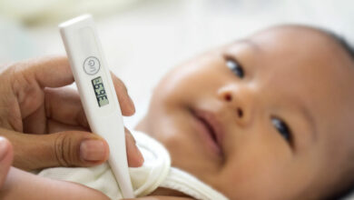 Taking your child's temperature using a thermometer