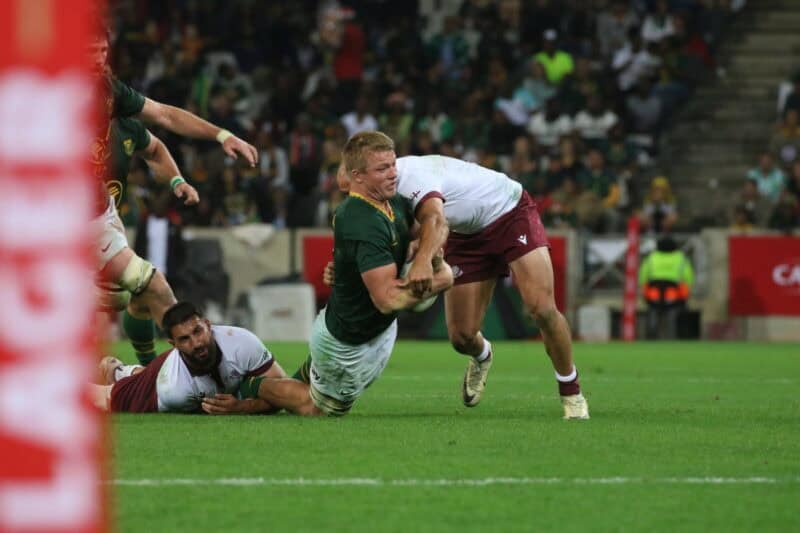 Pieter-Steph du Toit is brought to ground. > Photo: Blake Linder