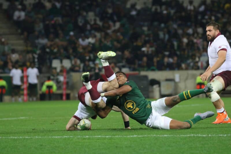 Grant Williams brings down his counterpart, Georgian scrum-half Vasil Lobzhanidze. > Photo: Blake Linder
