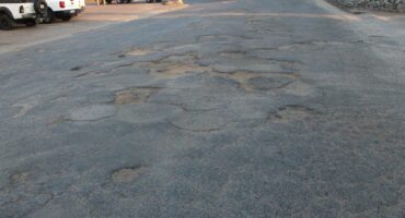 The potholes in Bosch Street. > Photos: Tumelo Waga Dibakwane
