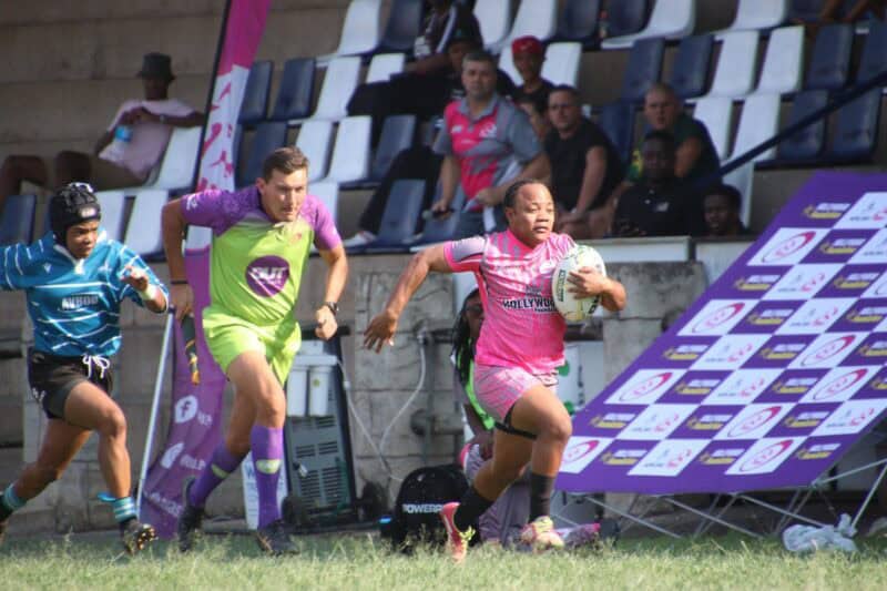 Megan Guambe breaks away for the Pumas Women. > Photo: Blake Linder