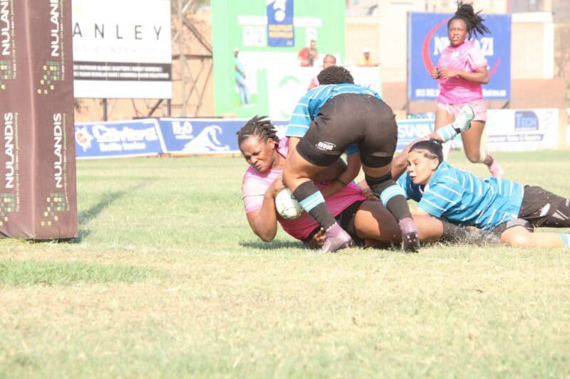 Alucia Mathebula crashes over to score her try. > Photos: Blake Linder