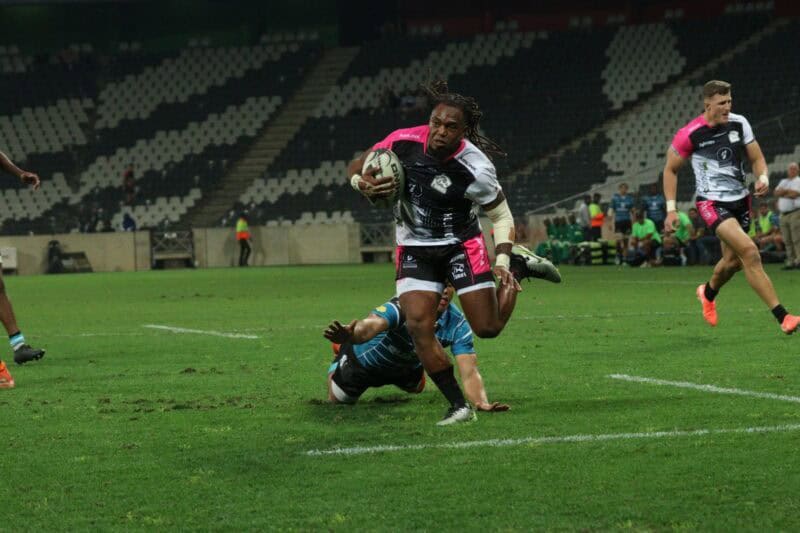 Darren Adonis shrugs off a Griquas defender on his way to scoring the last try of the game.