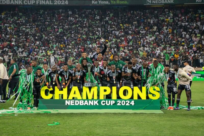 Orlando Pirates celebrate their 2024 Nedbank Cup final triumph at Mbombela Stadium. > Photo: Blake Linder