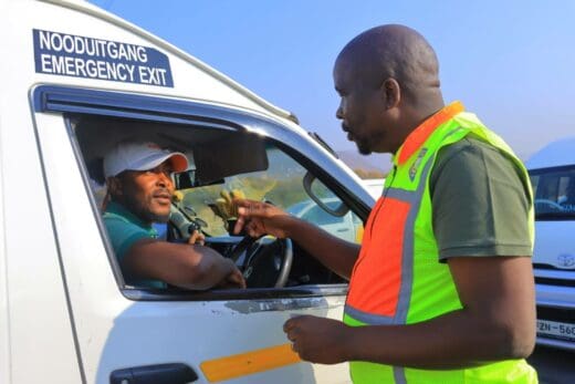FTLM's mayor Eddie Maila interacting with one of the taxi drivers during the roadblock.