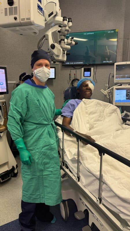Dr Morgan Hayes with one of his patients. > Photo: Supplied/Nelspruit Eye Institute
