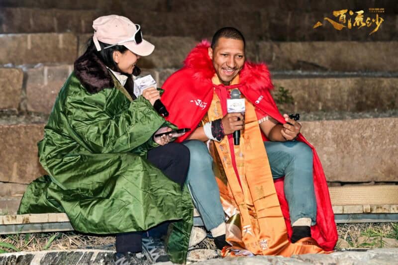 Damien Kühn speaks with a race official after crossing the finish line. > Photo: Sourced/Ultra Gobi 400