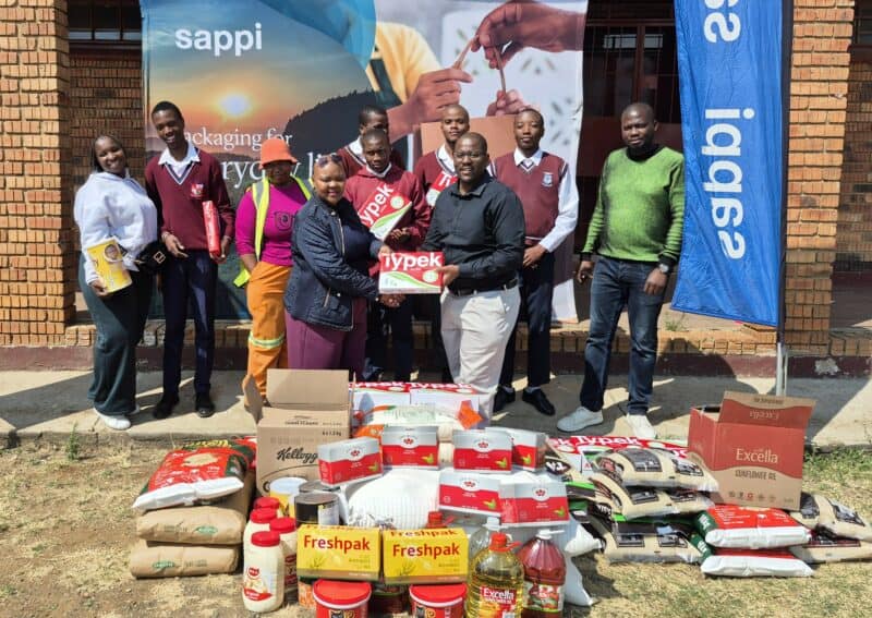 Siyabonga Maphumulo from Sappi (front right) handing over the goods to the team from Imemeza.