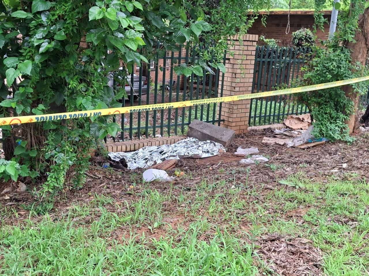 The body of a homeless man who was found on Piet Retief Street. > Photo: Tumelo Waga Dibakwane