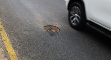 Potholes need to be fixed permanently.
