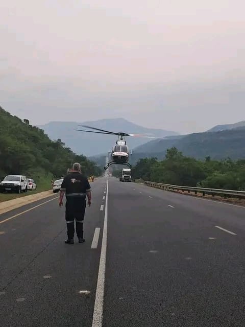 The chopper flies away from accident scene.