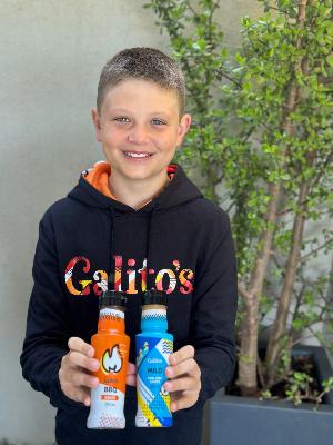 Luka Germishuys holds two Galito's sauces.