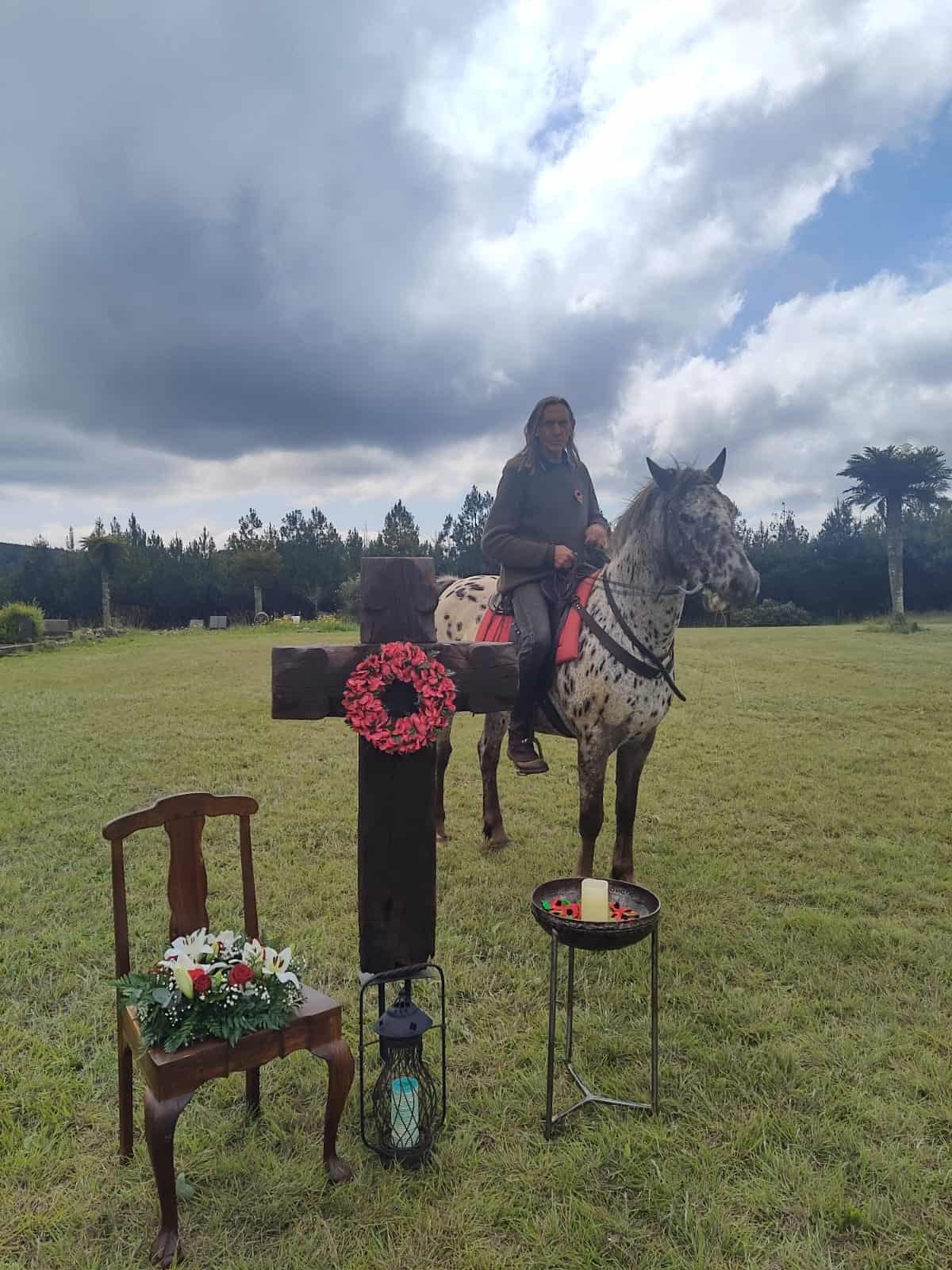 Christo Germishuys sits on his horse at the ceremony.