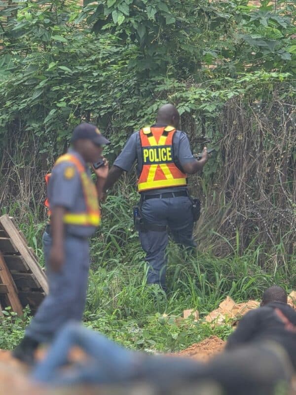 Two suspects on the ground. > Photo: Supplied/Anonymous