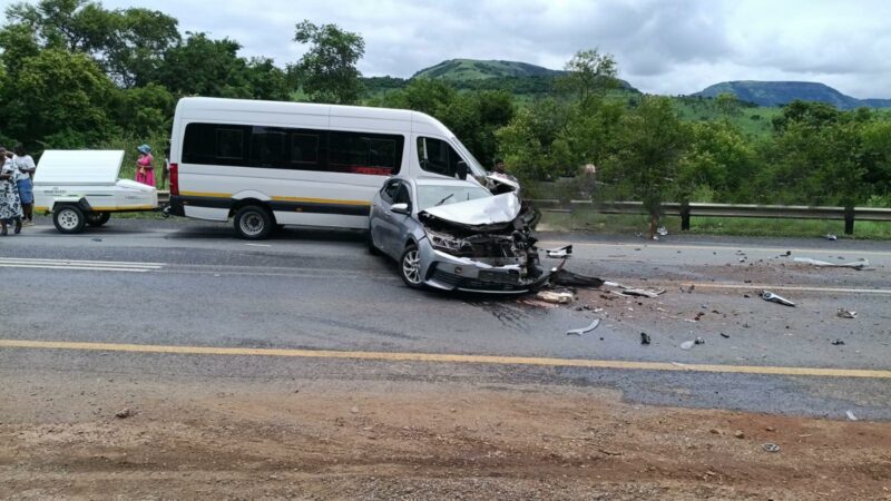 A light motor vehicle and mini-bus taxi after the crash.