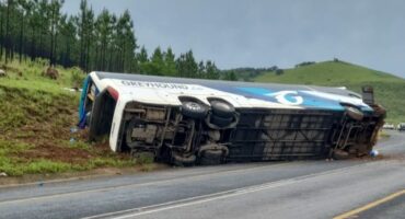 The bus that overturned on the R33 near eMkhondo. > Photo: Supplied/DCSSL