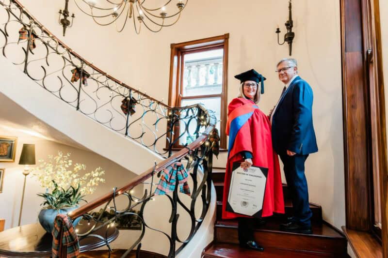 Dr Louise Fullard (centre) with her husband, Ps Johan. > Photo: Supplied/Dr Louise Fullard