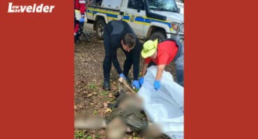 Divers recover the man's body.