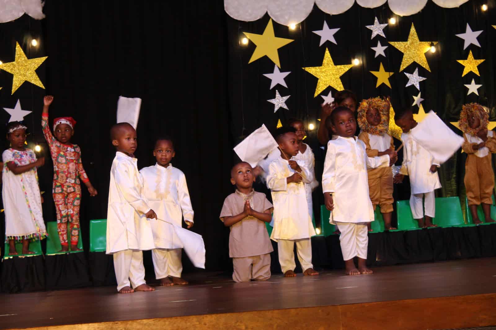 Young boys do an imaginative dance.