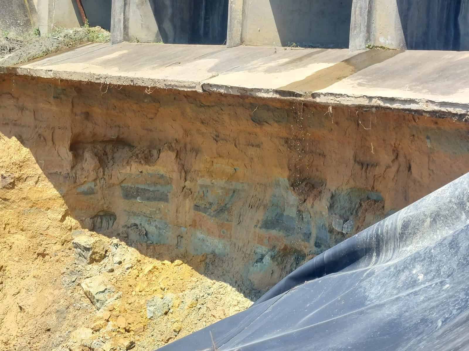 The collapsing wall of Senteeko Dam.