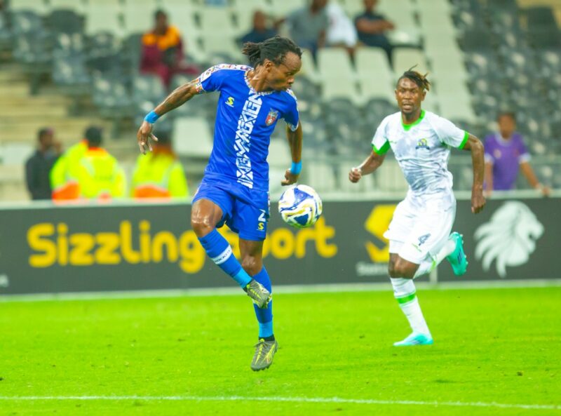 Mpho Mvelase gains control of the ball.