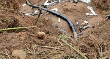 Com technician working on the faulty cable in Riverside. > Photo: Supplied