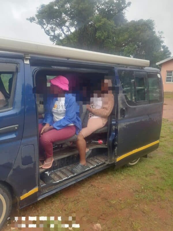 Suspects sit in the vehicle after a stop-and-search.