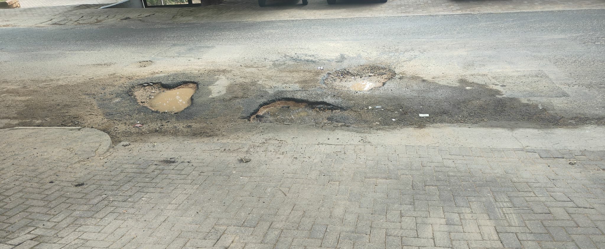 Potholes on Murray street.