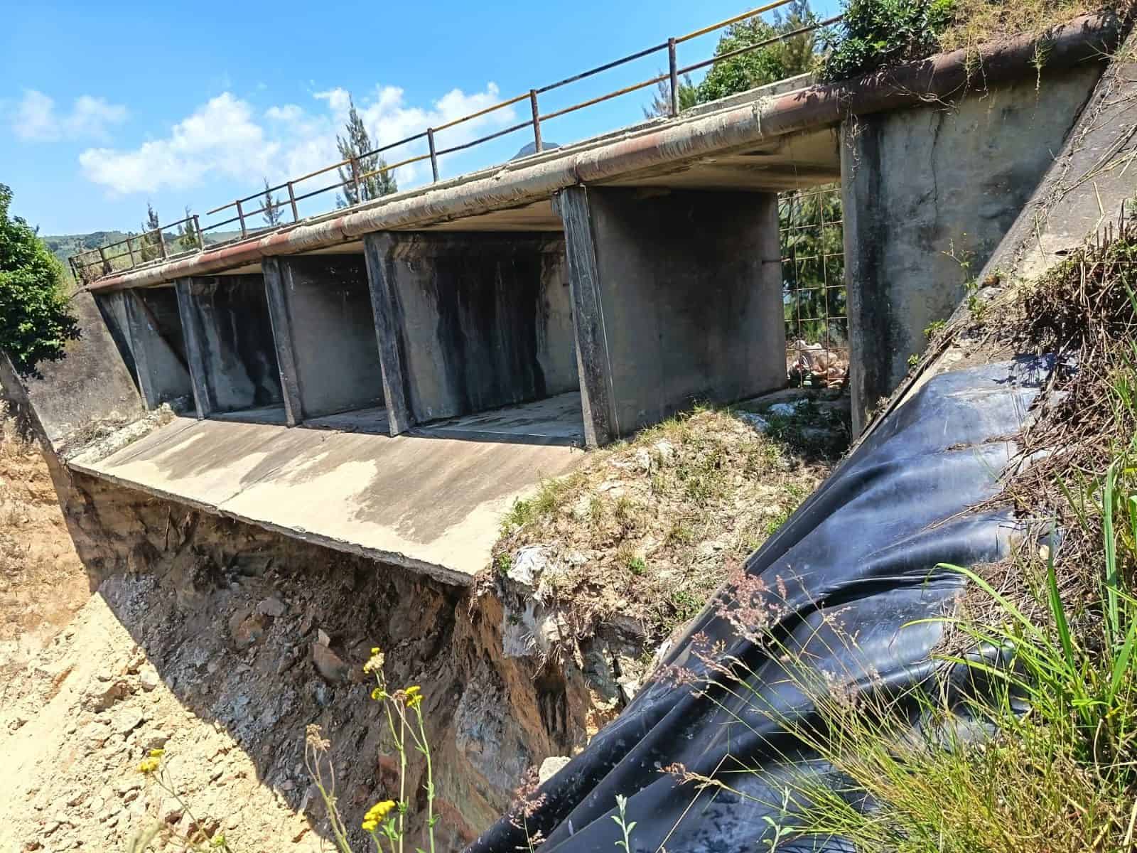 The damaged spillway of Senteeko dam.