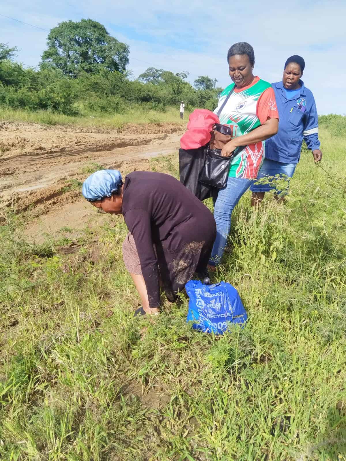 Teacher Goodness Shabangu just after she fell on the muddy ground, her colleagues Nomvula Mculu and Alucia Chiloane were in her company. >Photo: Supplied/Nomvula Mculu
