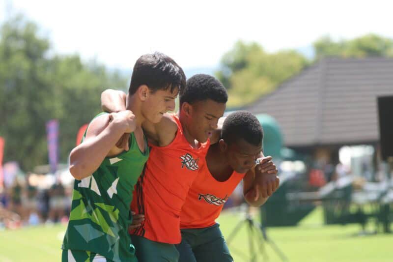Lydenburg's Anthony Howe and Rob Ferreira's Fumani Ndhlovu help an injured Radley Johnston to his feet.