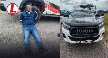 The Mozambican suspect and the suspected stolen Toyota Hilux. > Photos: Supplied/SAPS