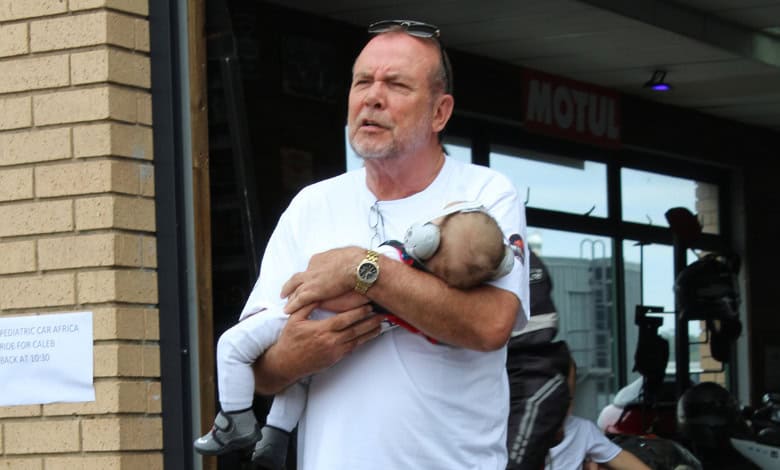 Dr André Hattingh holds Caleb. > Photo: Tumelo Waga Dibakwane