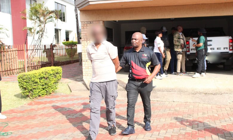 A suspect arrested from his home. 