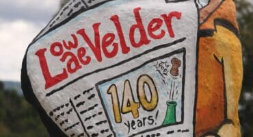 Old Joe holds a Lowvelder newspaper.