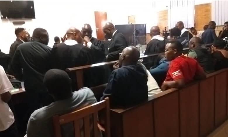 > Photo: Video screenshot of the accused during court procedures.
