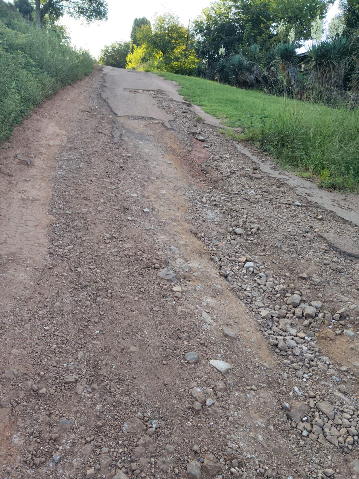 A Sabie street with practically no remaining tar.