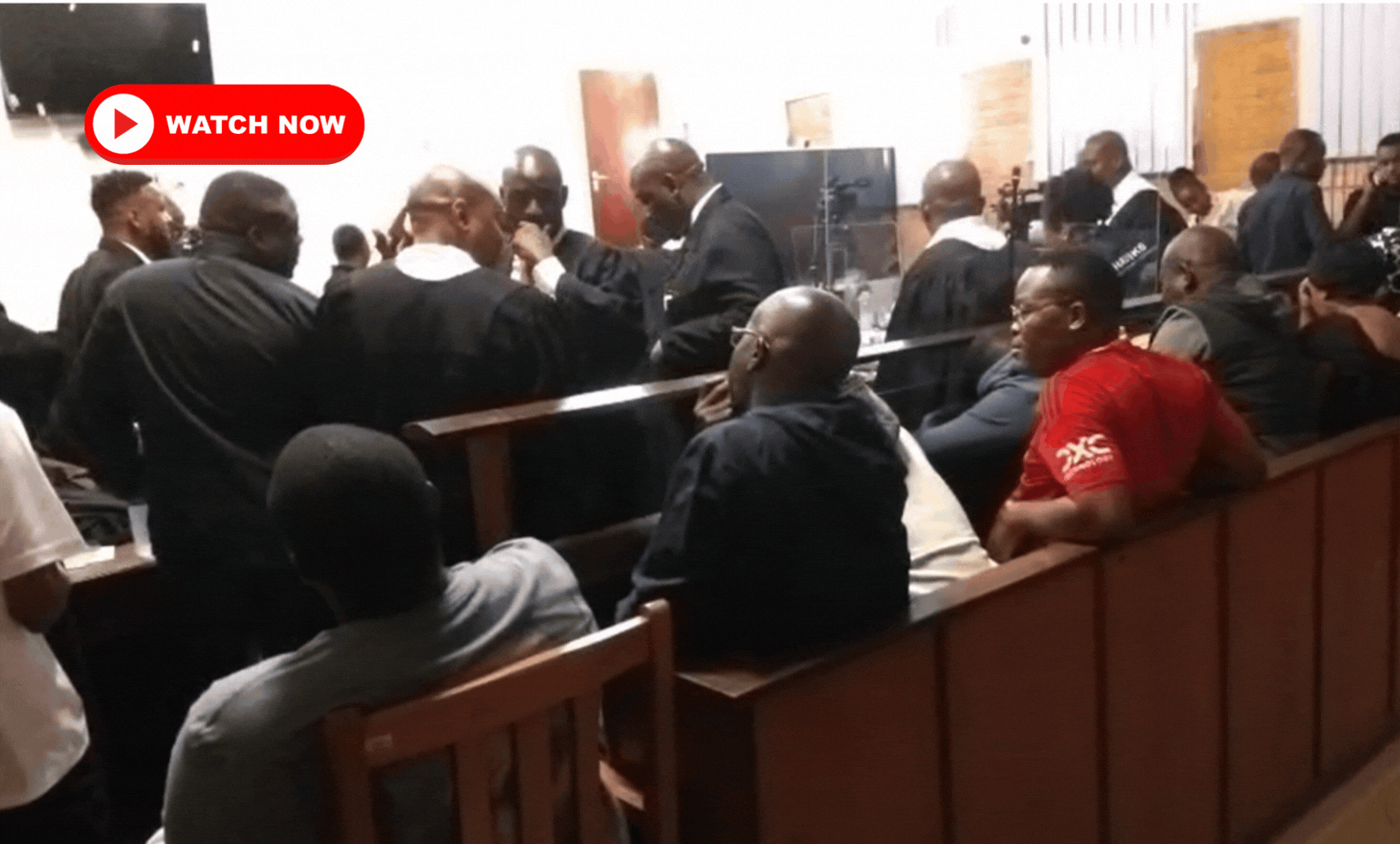 > Photo: Video screenshot of the accused during court procedures.