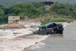 A Ford Ranger bakkie stuck in the Komatipoort River.