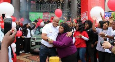 SPAR Sonpark store manager Kingsley Chidi with the winner, Emmah Ngomane. > Photos: Zané Botes