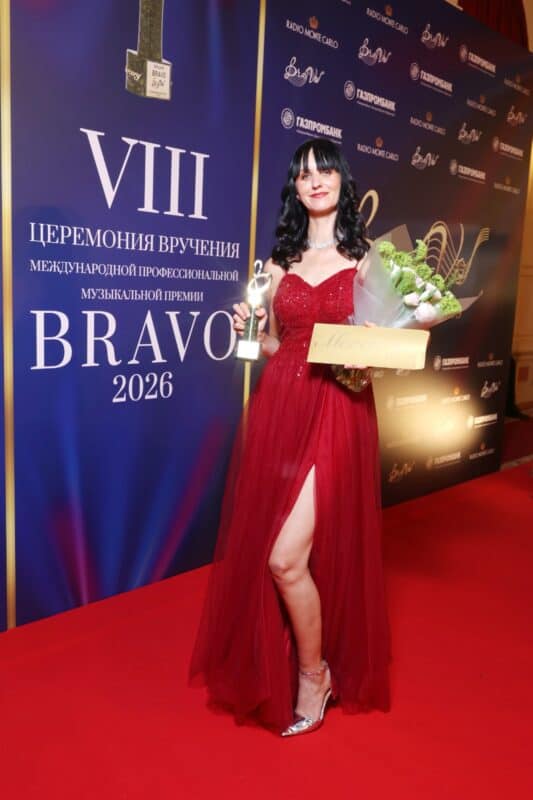 Naomi Tagg with her award at the BraVo International Music Awards.