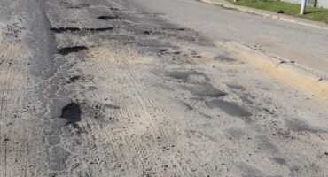 Some of the potholes in Bosch Street. > Photo: Tumelo Waga Dibakwane